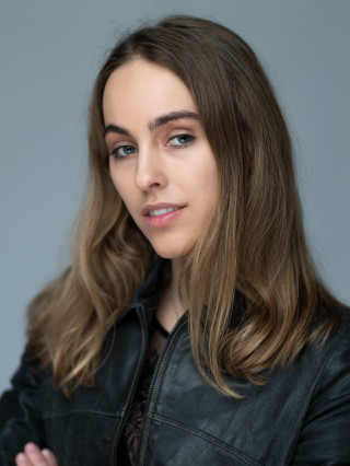 Hostess Mia M.