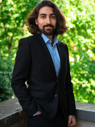Host Tolga A.